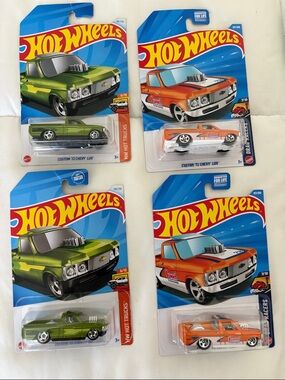 4 hotwheels Chevy luv’s